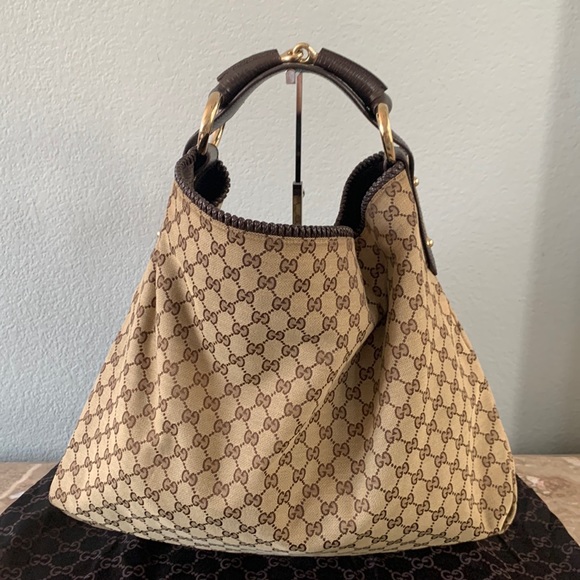 Gucci Handbags - Gucci GG mono canvas Brit hobo bag